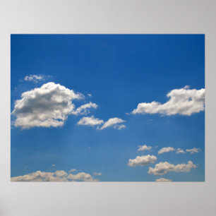 Witte wolken op blauwe hemel poster
