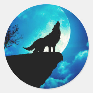 Wolf in silhouette die naar de volle maan kijkt ronde sticker