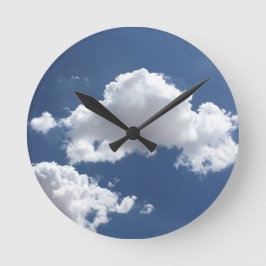 Wolken in een blauwe lucht ronde klok