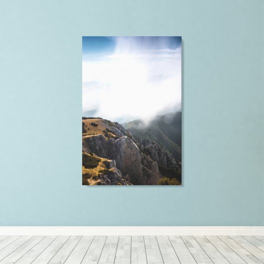 Wolken over bergen canvas afdruk (Insitu (Houten vloer))