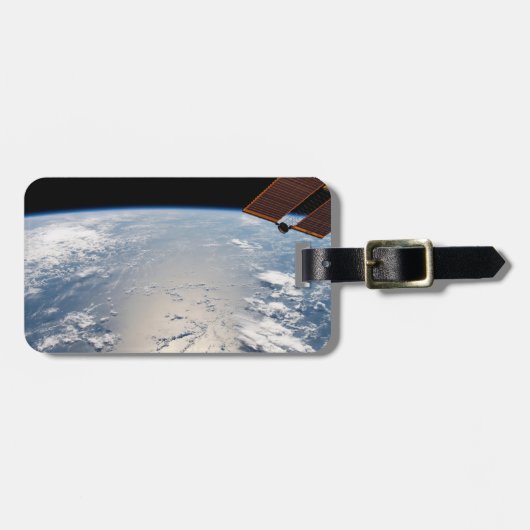 Wolkenformaties rond zonneschijn voor de Stille Oc Bagagelabel (Voorkant horizontaal)