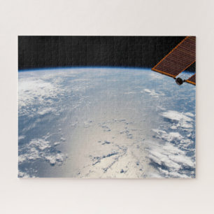 Wolkenformaties rond zonneschijn voor de Stille Oc Legpuzzel
