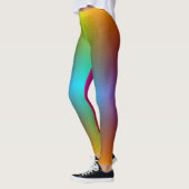 Woman in rainbow gradient leggings with a subtle  (Gauche)