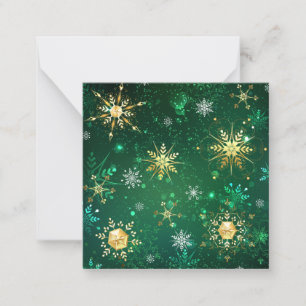 Xmas Golden Snowflakes op groene achtergrond Notitiekaartje