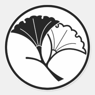 Yin en yang ginkgo bladeren in threadlike ring ronde sticker