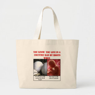 YOU KNOW YOU LIVE IN A COUNTRY RAN BY IDIOTS WHEN GROTE TOTE BAG