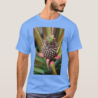 Young pineapple growing under the tropical sun ret t-shirt