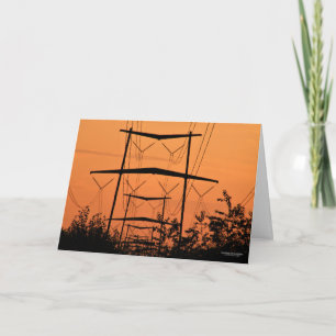 Zachte oranje zonsondergang over hoogspanningslijn kaart
