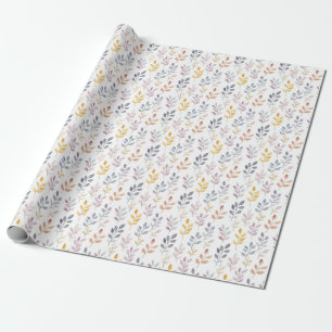 Zachte regenboogbladeren op wit cadeaupapier