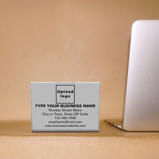 Zakelijk merk op grijs rechthoekig fotoblok