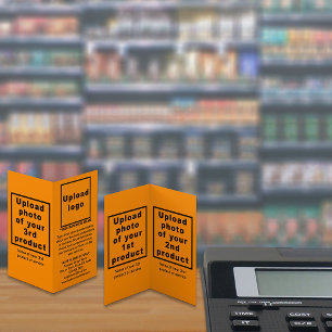 Zakelijke producten op kleine oranje gevouwen kaar kaart