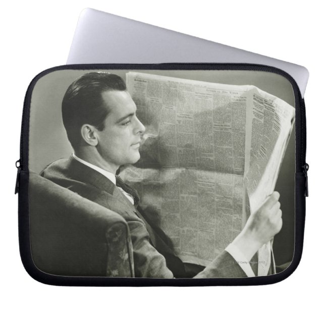 Zakenman die de krant leest laptop sleeve (Voorkant)