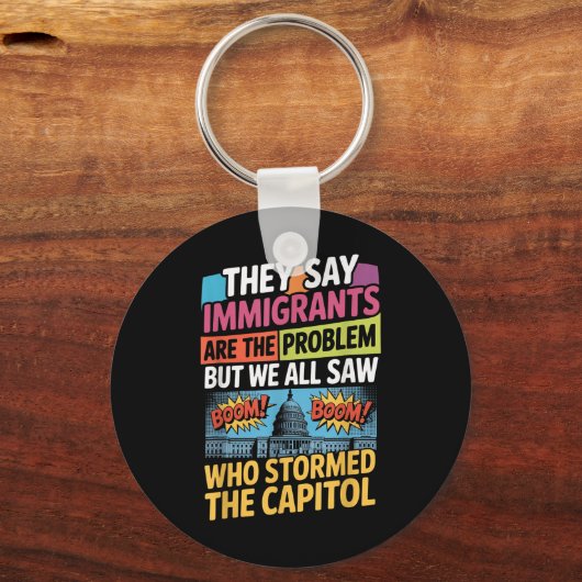 Ze zeggen dat immigranten het probleem zijn, maar  sleutelhanger (Voorkant)