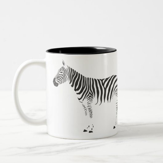 Zebra omwikkeling rond tweekleurige koffiemok (Links)