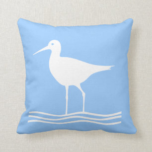 ZEE BIRD. WHITE op blauwe kussen