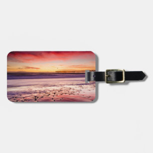 Zeegezicht en pier bij zonsondergang, CA Bagagelabel
