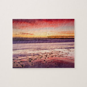 Zeegezicht en pier bij zonsondergang, CA Legpuzzel