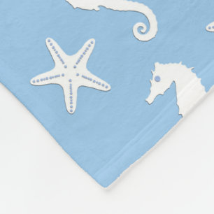 Zeepaard en zeester - wit op bleek blauw fleece deken