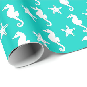 Zeepaardvis - wit op turquoise cadeaupapier