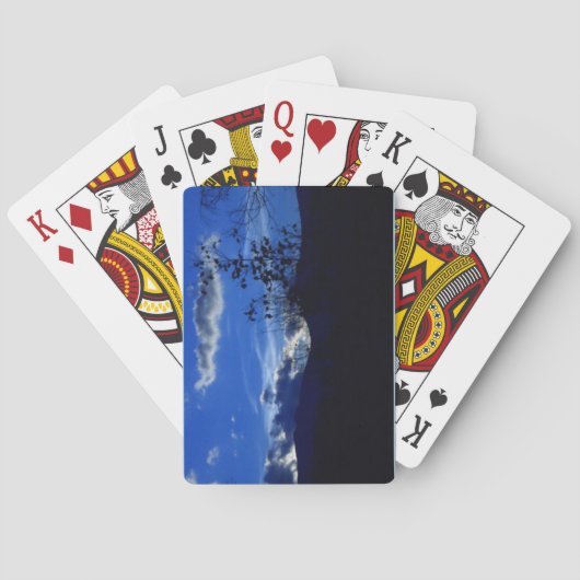 Zeer blauwe ritgebergte die kaarten afspeelt (Achterkant)