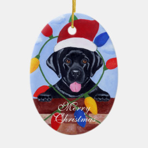 Zeer kleine zwarte labrador voor feestmaal keramisch ornament