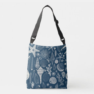 Zeeschalen op donkerblauw crossbody tas
