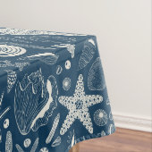 Zeeschalen op donkerblauw tafelkleed (Voorbeeld)