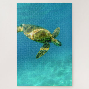 Zeeschildpad zwemt in turkoois oceaanwater legpuzzel