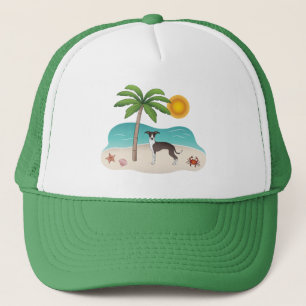 Zegel en witte ijzige hond op het strand van de tr trucker pet