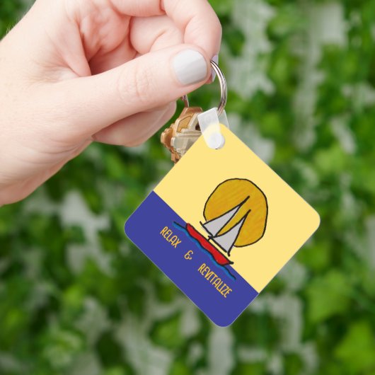 Zeilboot in de zon sleutelhanger (Hand)