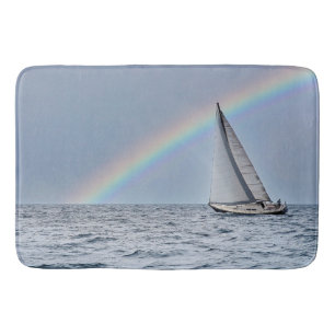Zeilboot met regenboog badmat