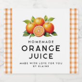 Zelfgemaakt oranje sap met sinaasappels en bladere likeurfles etiket (Enkel label)
