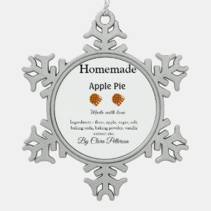 Zelfgemaakte appeltaart gemaakt met liefde en ingr tin sneeuwvlok ornament