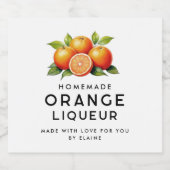 Zelfgemaakte oranje likeur met sinaasappels en bla likeurfles etiket (Enkel label)