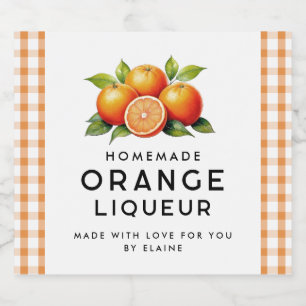 Zelfgemaakte oranje likeur met sinaasappels en bla likeurfles etiket