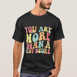 Zijn meer dan een test score Groovy leraar test da T-shirt