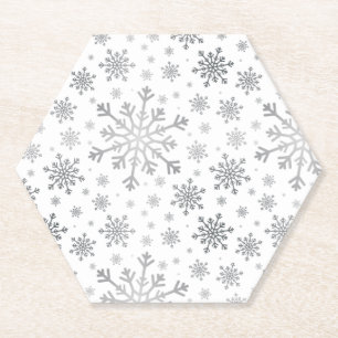 zilveren kerstsnowflakes op winterwit kartonnen onderzetters