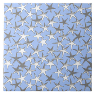 Zilveren sterren op bleek blauw tegeltje