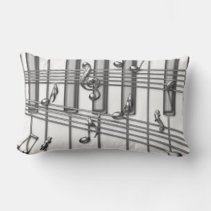 Zilveren vleugel piano toetsenbord met muzieknoten kussen