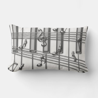 Zilveren vleugel piano toetsenbord met muzieknoten kussen
