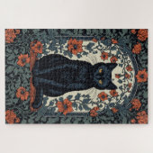 Zittende zwarte kat  bloemig legpuzzel (Horizontaal)