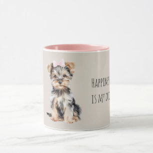 Zoete bruine puppy hond met strik mok