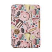 Zoete lekkernijen op roze badmat (Voorkant Verticaal)