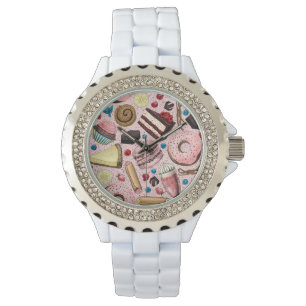 Zoete lekkernijen op roze horloge