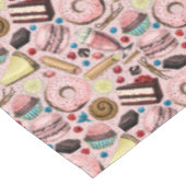 Zoete lekkernijen op roze tafelkleed (Gekanteld)