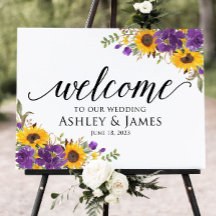 Zonnebloemen en paarse bloemen bruiloft welkom tek