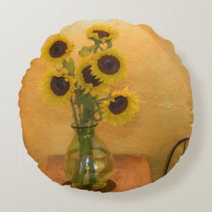 Zonnebloemen in vaas op tafel 2 rond kussen