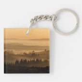 Zonneoploop over het landschap van Misty Rolling H Sleutelhanger (Achterkant)