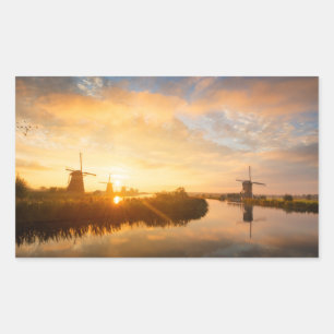 Zonneopstand boven windmolens en een rivier in Ned Rechthoekige Sticker