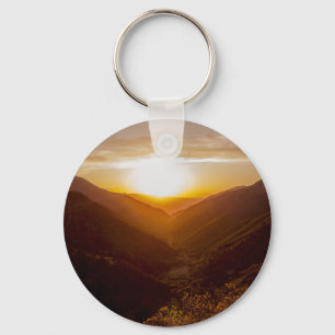 Zonneover berglandschap sleutelhanger